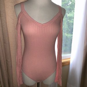 Cutout shoulder pink long sleeve bodysuit timing